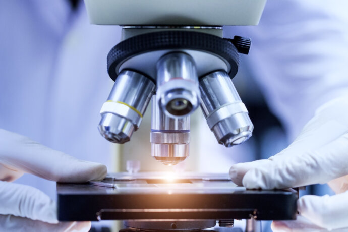 UT Health San antonio clinical study on glucagon with scientist and microscope